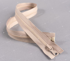 Plastic molded zipper beige 65 cm